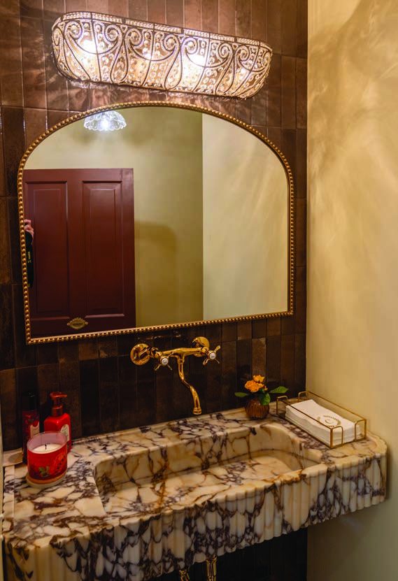 A hallway was repositioned to include a new bathroom.